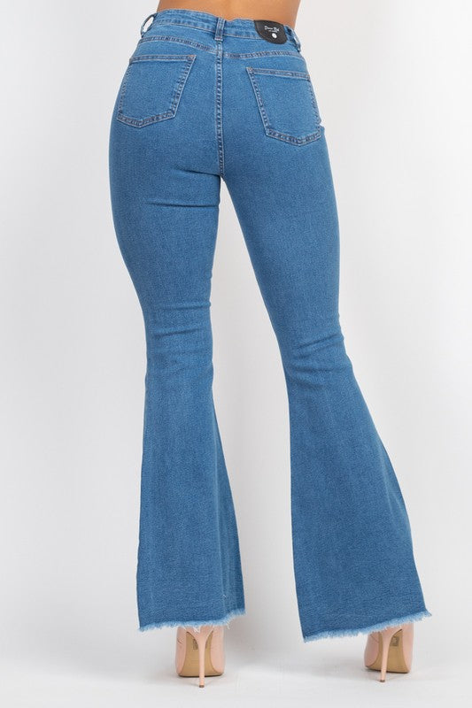 REACHING NEW HEIGHTS FLARED JEANS